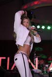 Fergie shows her tight body as she performs at Ed Hardy party in Hollywood