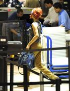 th_43367_Tikipeter_Rihanna_departs_from_LAX_003_123_33lo.jpg