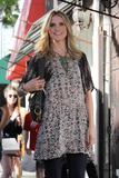 th_39380_celebrity_paradise.com_TheElder_HeidiKlum2011_03_09_filmingGNTinBeverlyHills11_122_478lo.jpg