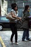 Amy Winehouse & her birdcage strolling in London